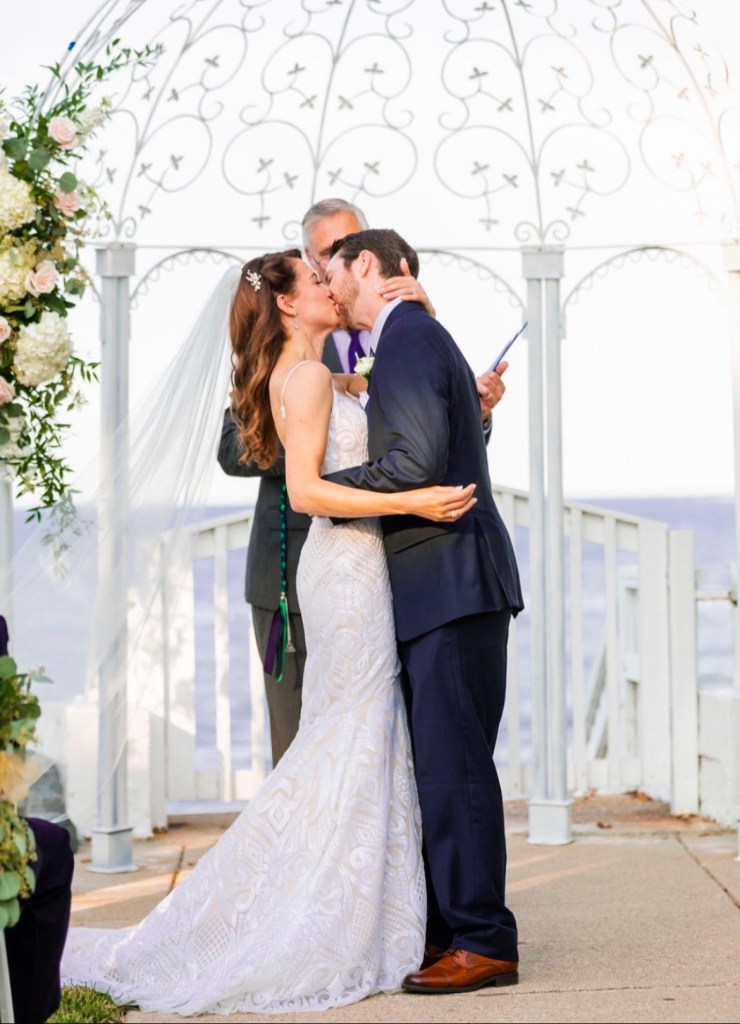 Bride and Groom kiss at the alter
Haley Paige West Gown
Celebrations at the Bay
Maryland Wedding